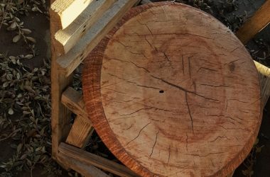 a chair outside with a cushion